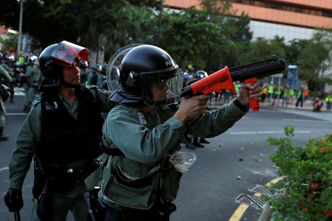 Hong Kong Police Fire Tear Gas, Storm Shopping Mall, After Protesters Gather