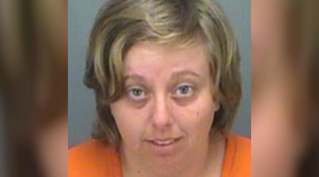 Woman Arrested After Video Showed Her Kicking, Choking Dog
