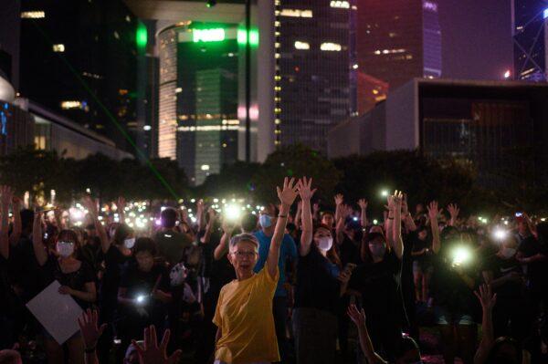 People attend a rally to mark the fifth anniversary of the "Umbrella Movement", in the Admiralty area of Hong Kong on Sept. 28, 2019. (Philip Fong/AFP/Getty Images)