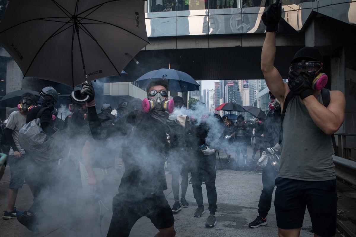 As Hong Kong Protesters March in Unauthorized Rally, Police Ratchet Up Tactics
