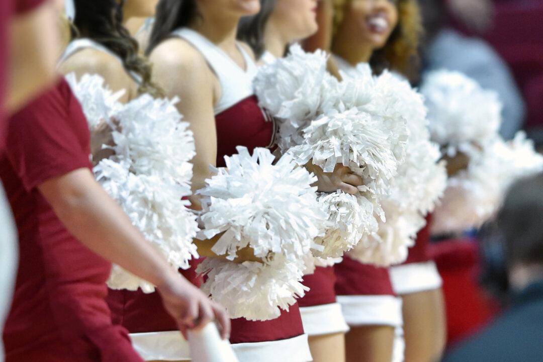 Basketball Players Rally Behind Cheerleader With Down Syndrome, Protect Her From Bullies