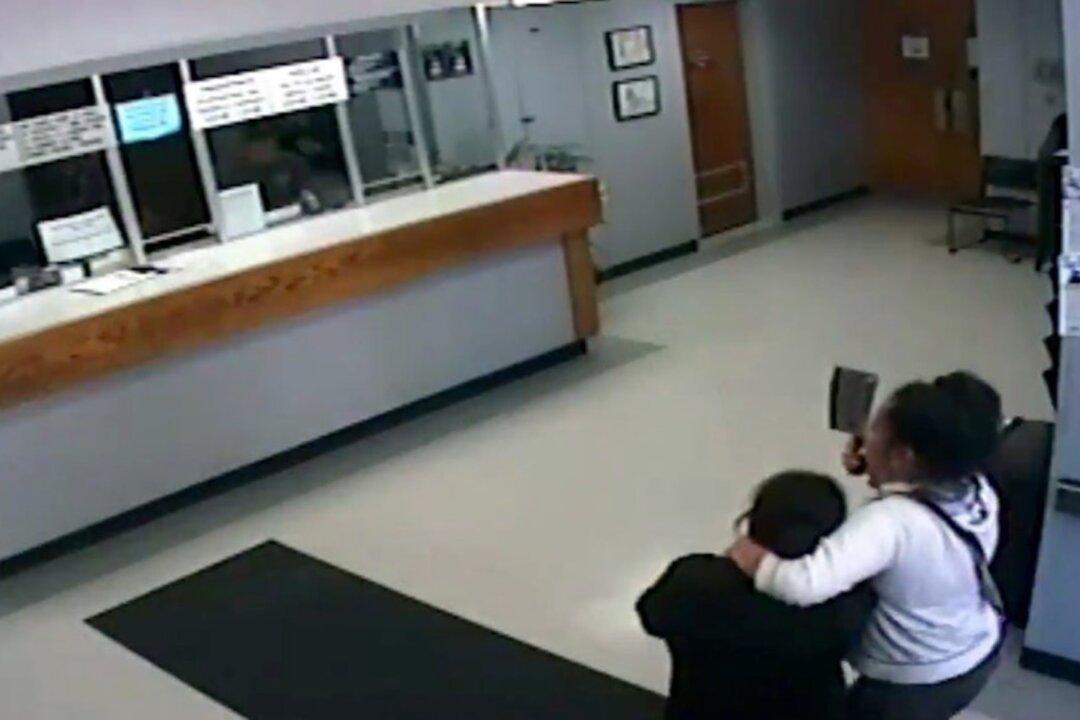 Video Shows Moment Cleaver-Wielding Woman Takes Hostage Inside Police Station