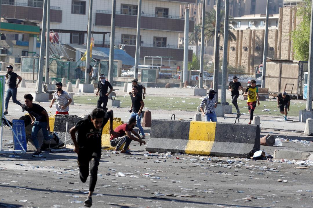 46 Killed as Uprising Grips Iraq