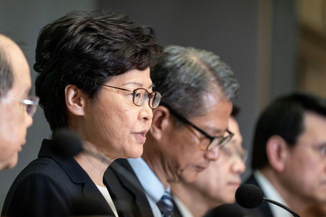 Hong Kong Leader Carrie Lam Invokes Emergency Law to Ban Masks Amid Enduring Protests