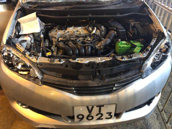 Protesters smashed the car of the attacker who allegedly shot a 14-year-old in Yuen Long, Hong Kong, on Oct. 4. (Yu Tianyou/The Epoch Times)