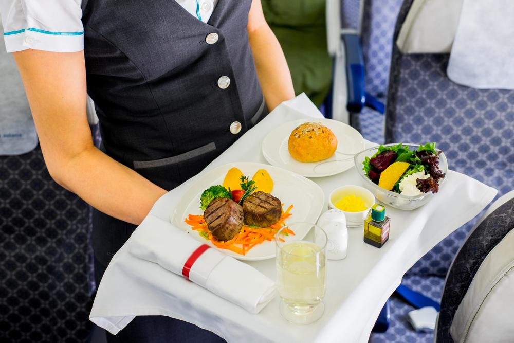 Illustration - Shutterstock | <a href="https://www.shutterstock.com/image-photo/air-hostess-serves-722843899?src=khz8Eo2d4bkIjAFM_Vwqjw-1-61">Aureliy</a>