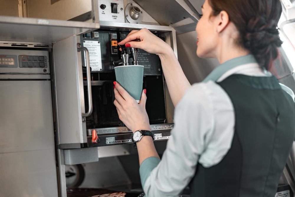 Illustration - Shutterstock | <a href="https://www.shutterstock.com/image-photo/young-stewardess-preparing-tea-passenger-airplane-1486500764?src=ijmmBVjAR-7oa9oe7ioQig-1-2">Olena Yakobchuk</a>