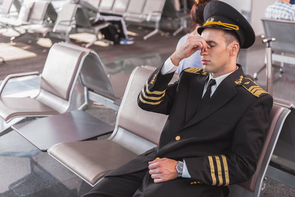Illustration - Shutterstock | <a href="https://www.shutterstock.com/image-photo/exhausted-adult-airman-terminal-727099381?src=jqUNJFvwJ7UNv0fXrNQk9A-1-0">Olena Yakobchuk</a>