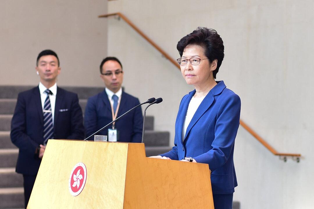 Hong Kong Leader Carrie Lam Pushes Forward With Controversial Anti-Mask Law