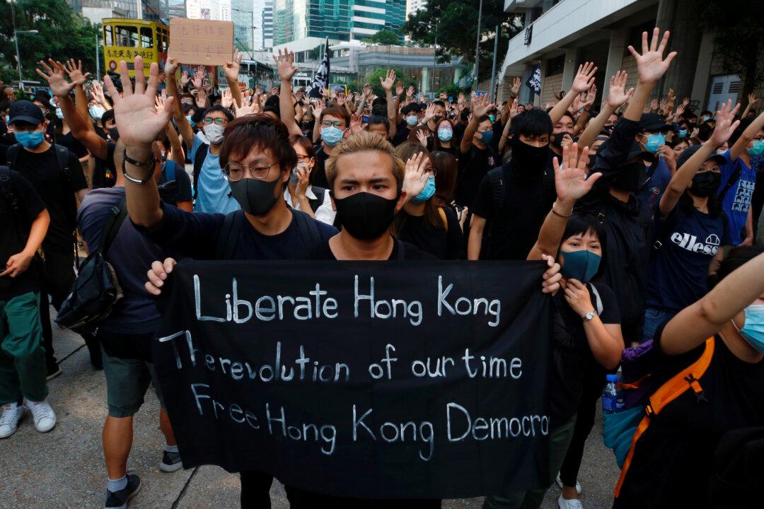 Hong Kong Protesters Gather Outside High Court to Show Support for Detained Activist