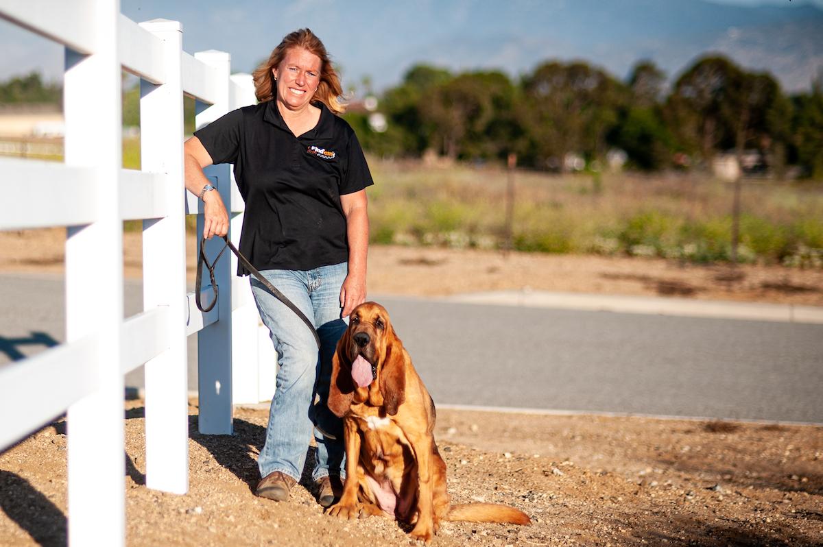 A Woman and Her Bloodhounds Are on the Trail