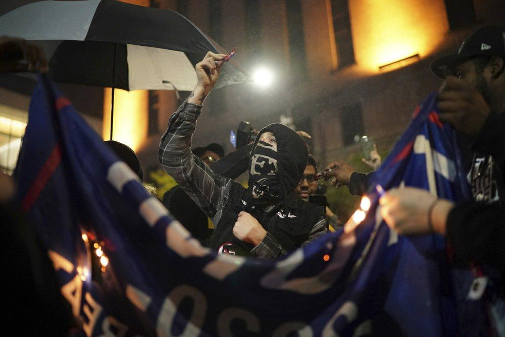 Anti-Trump Protesters in Minneapolis Burn American Flag, MAGA Hats