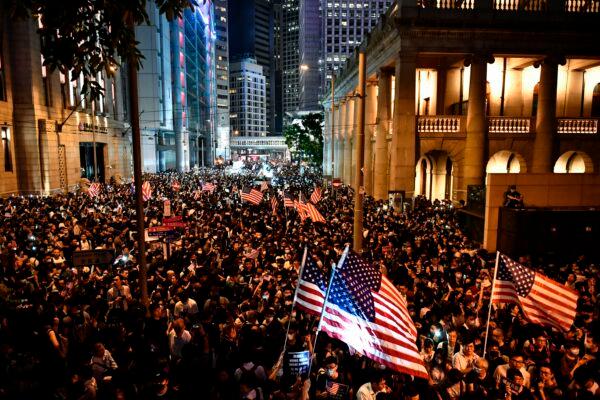 Protesters attend a rally in Hong Kong on Oct. 14, 2019, calling on US politicians to pass a bill that could alter Washington's relationship with the trading hub. (Anthony Wallace/AFP via Getty Images)