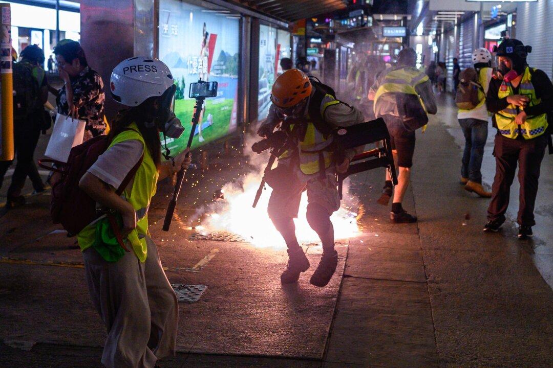 Hong Kong Police Switch to Flesh-Burning Tear Gas Made in China