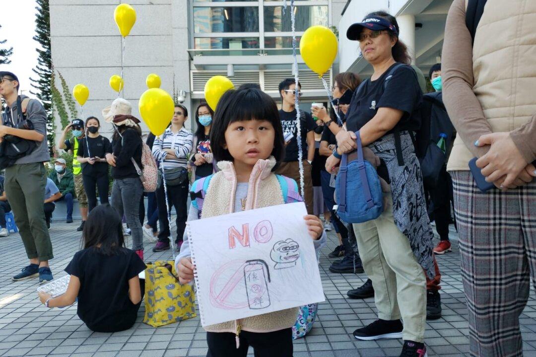 Parents, Children Standing Side-by-Side Demand HK Police Stop Using Tear Gas