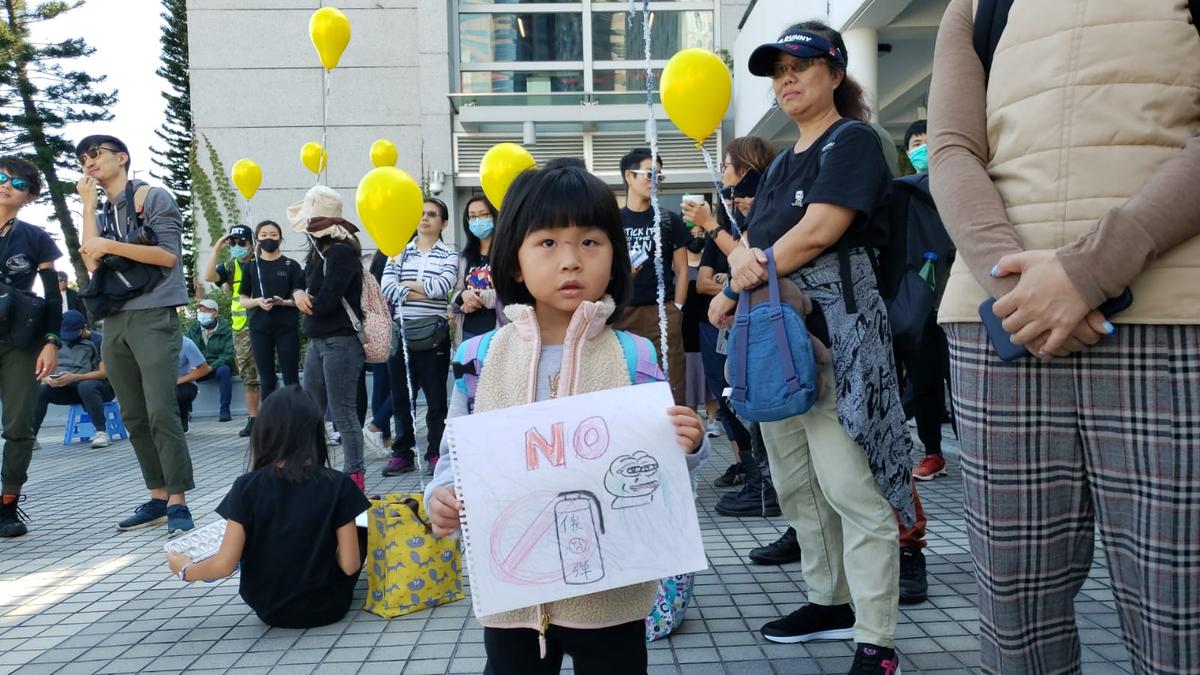 Parents, Children Standing Side-by-Side Demand HK Police Stop Using Tear Gas