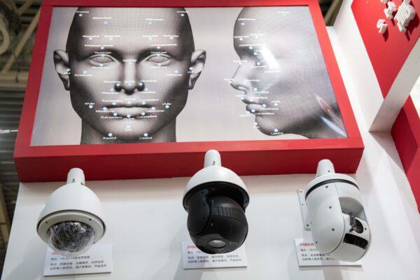 Artificial Intelligence security cameras with facial recognition technology at the 14th China International Exhibition on Public Safety and Security at the China International Exhibition Center in Beijing on Oct. 24, 2018. (Nicolas Asfouri/AFP via Getty Images)