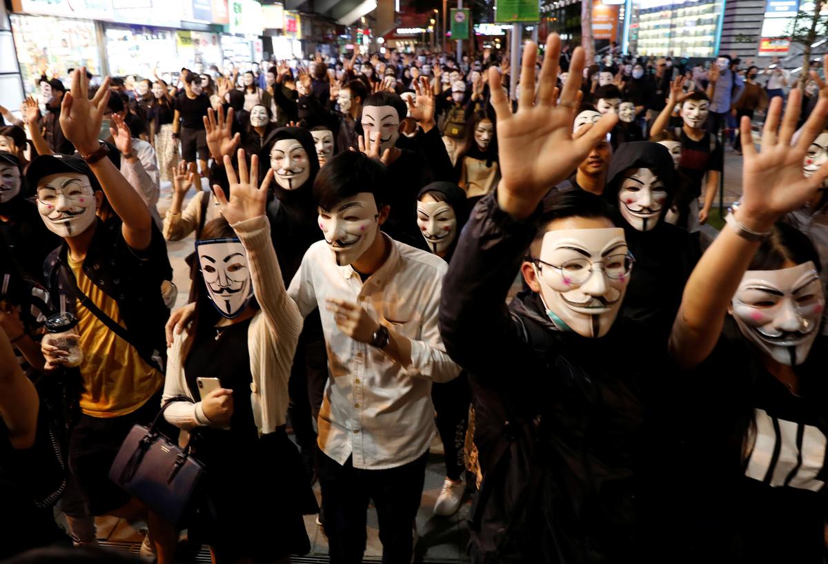 Masked Protesters Take to Hong Kong Streets