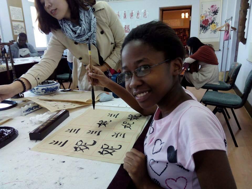 African Students on Chinese Scholarships Made to Sing Military Songs, Salute Chinese Regime Flag