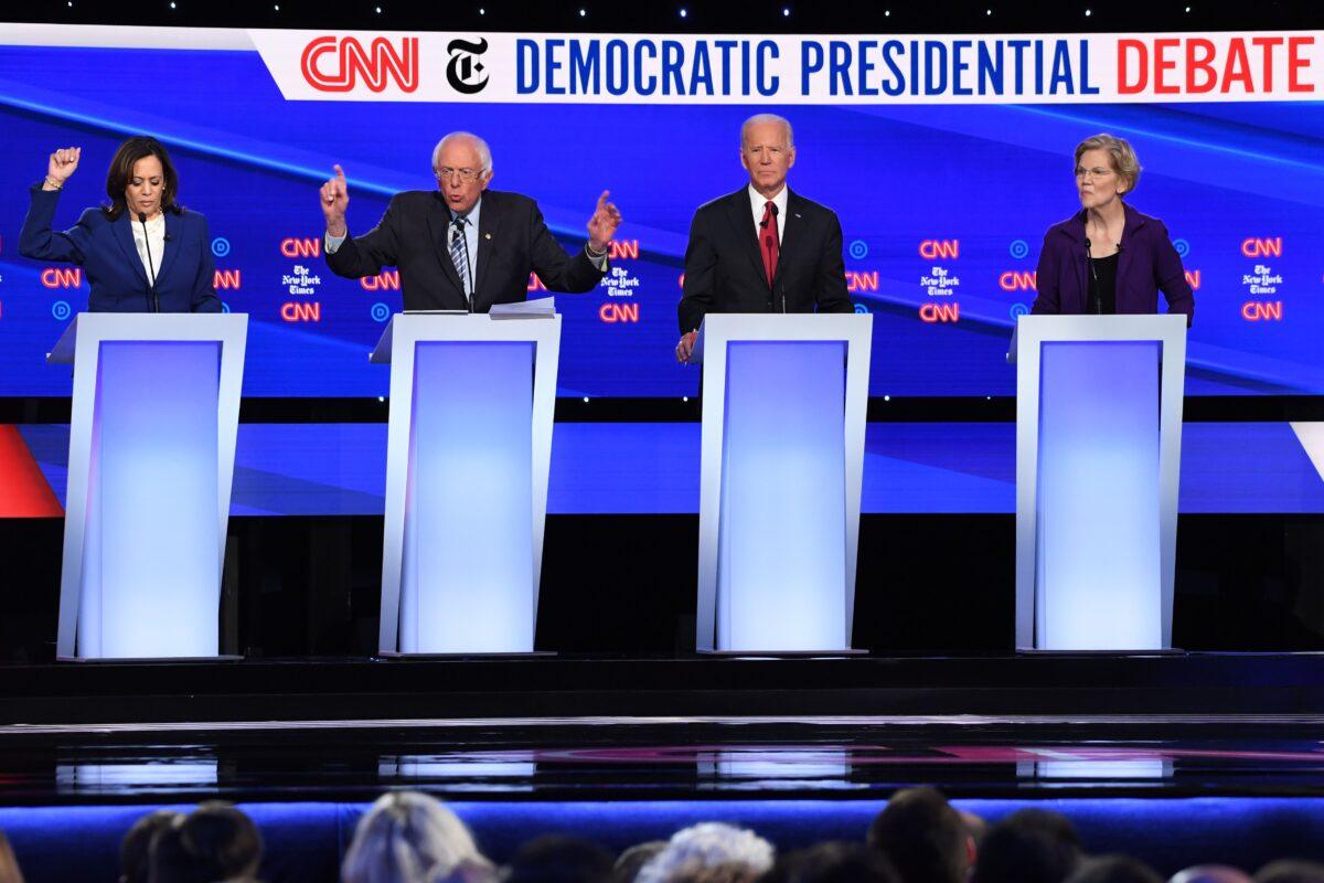 Democratic presidential hopefuls (L-R) Sen. Kamala Harris (D-Calif.), Sen. Bernie Sanders (I-Vt.), former Vice President Joe Biden, and Sen. Elizabeth Warren (D-Mass.) take part in the fourth Democratic primary debate of the 2020 presidential campaign season at Otterbein University in Westerville, Ohio, on Oct. 15, 2019. (Saul Loeb/AFP via Getty Images)