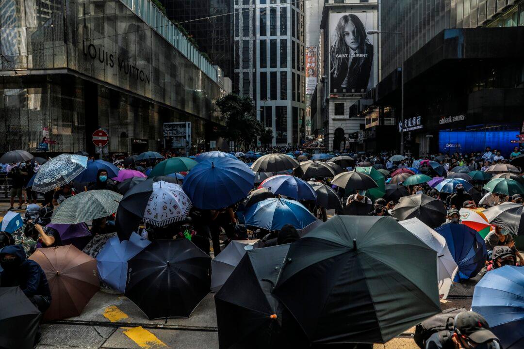 Beijing Signals Tougher Tactics on Hong Kong as City Government Convenes Emergency Meeting