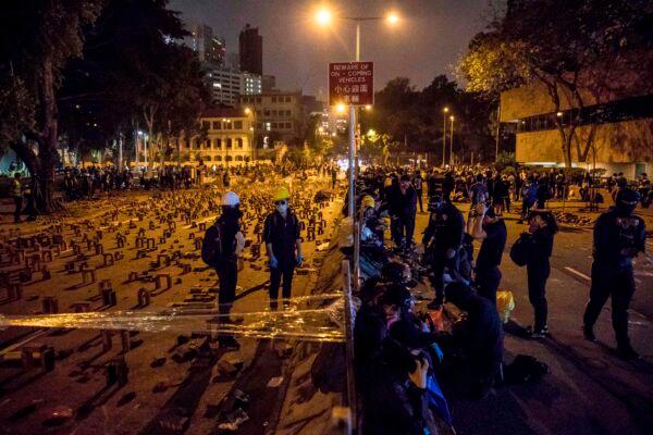 Protesters gather on a blocked road at the Hong Kong Polytechnic University on Nov. 14, 2019. (DALE DE LA REY/AFP via Getty Images)