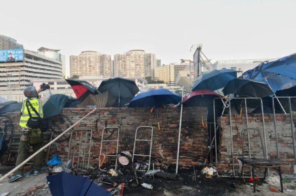 Protesters build barricades on Polytechnic University campus in Hong Kong on Nov. 17, 2019. (Sung Pi Lung/The Epoch Times)