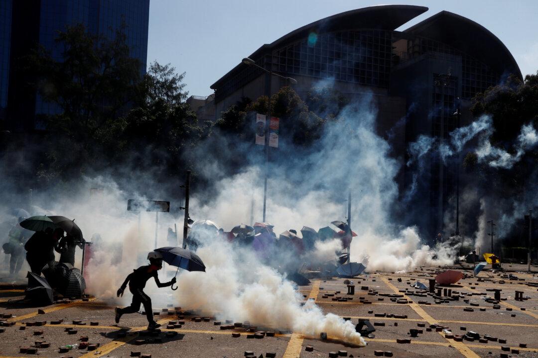 Hong Kong Police Escalate Aggression in Violent Clashes at University Campus