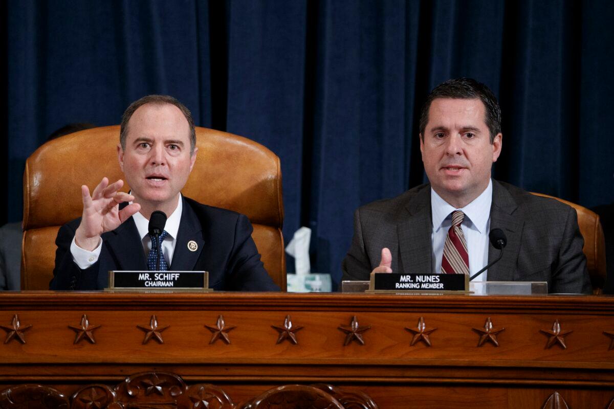 House Intelligence Chairman Adam Schiff (D-Calif.) intervenes to voice his concern about keeping the whistleblower's identity secret as Ranking Member Devin Nunes (R-Calif.) questions National Security Council Director for European Affairs Lt. Col. Alexander Vindman during testimony before the House Intelligence Committee in the Longworth House Office Building on Capitol Hill in Washington on Nov. 19, 2019. (Shawn Thew-Pool/Getty Images)