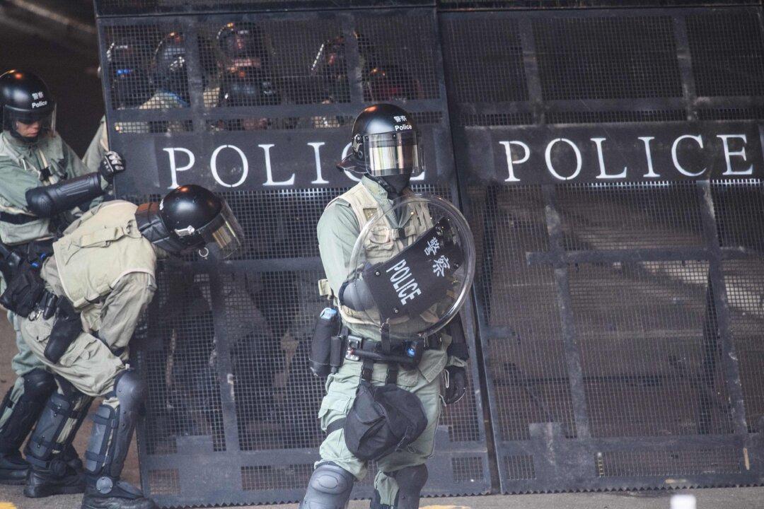 Democracy Group ‘Shocked’ That Hong Kong Cops Were Granted Visas to Attend Police Games in Winnipeg