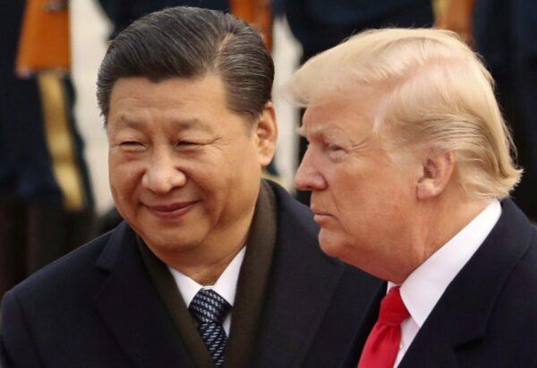 U.S. President Donald Trump and Chinese leader Xi Jinping participate in a welcome ceremony at the Great Hall of the People in Beijing, China, on Nov. 9, 2017. (Andrew Harnik/AP Photo)