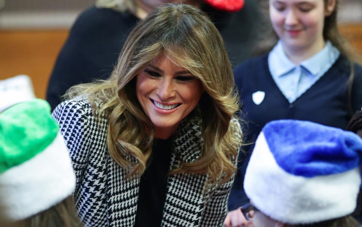 Melania Trump Hands Out Christmas Presents to London Children