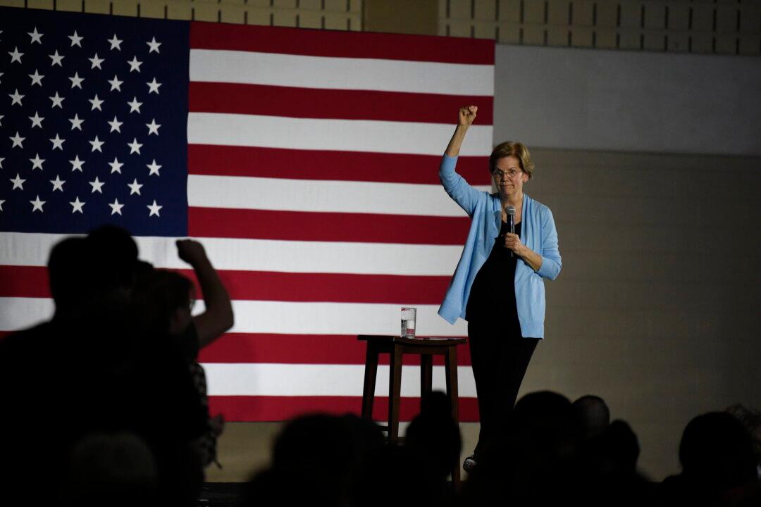 Warren Made at Least $1.9 Million for Legal Work