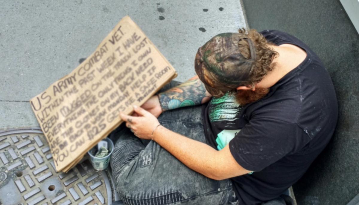 ‘Homeless’ Kid Sits Next to Homeless Veteran in Social Experiment–and People’s Responses Are Shocking