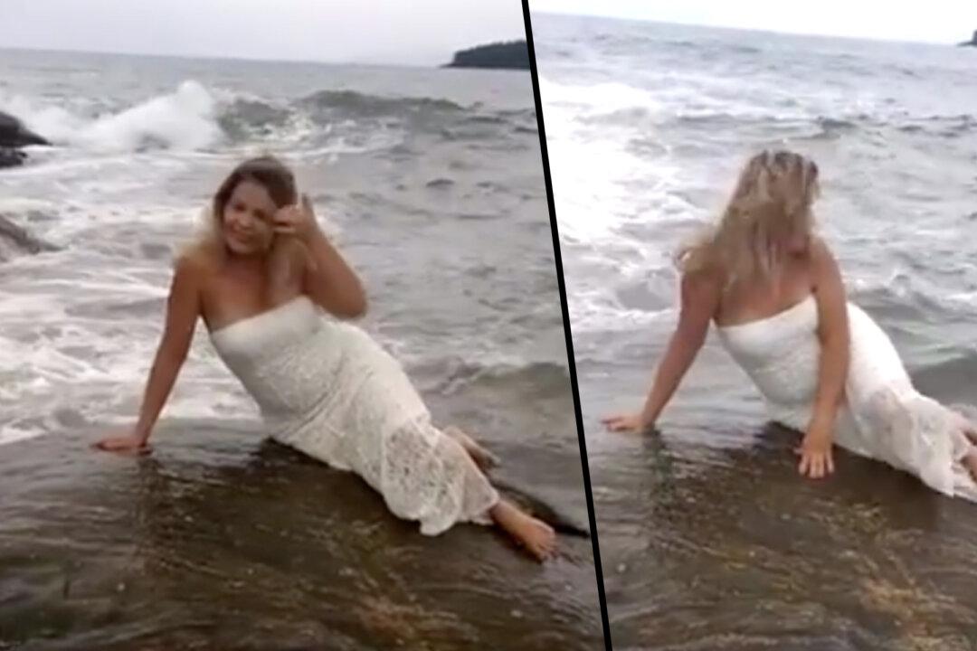 Wife Poses on Ocean Rock for the Perfect Photo–but Watch Closely What’s Coming Behind Her