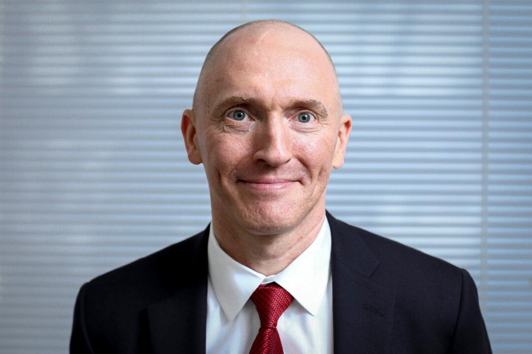 Former Trump Aide Page Sues DNC, Law Firm Over Steele Dossier