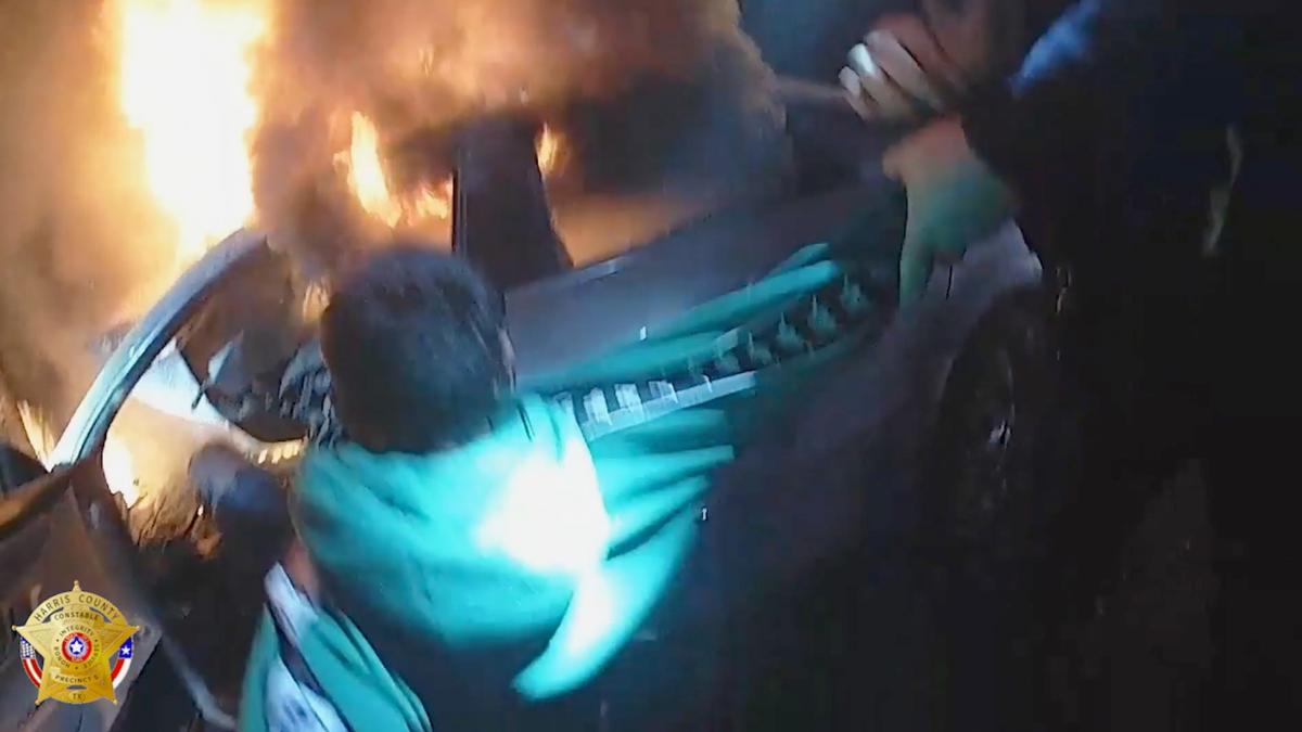 Driver Trapped in Burning Car Rescued by Texas Deputies in Dramatic Video