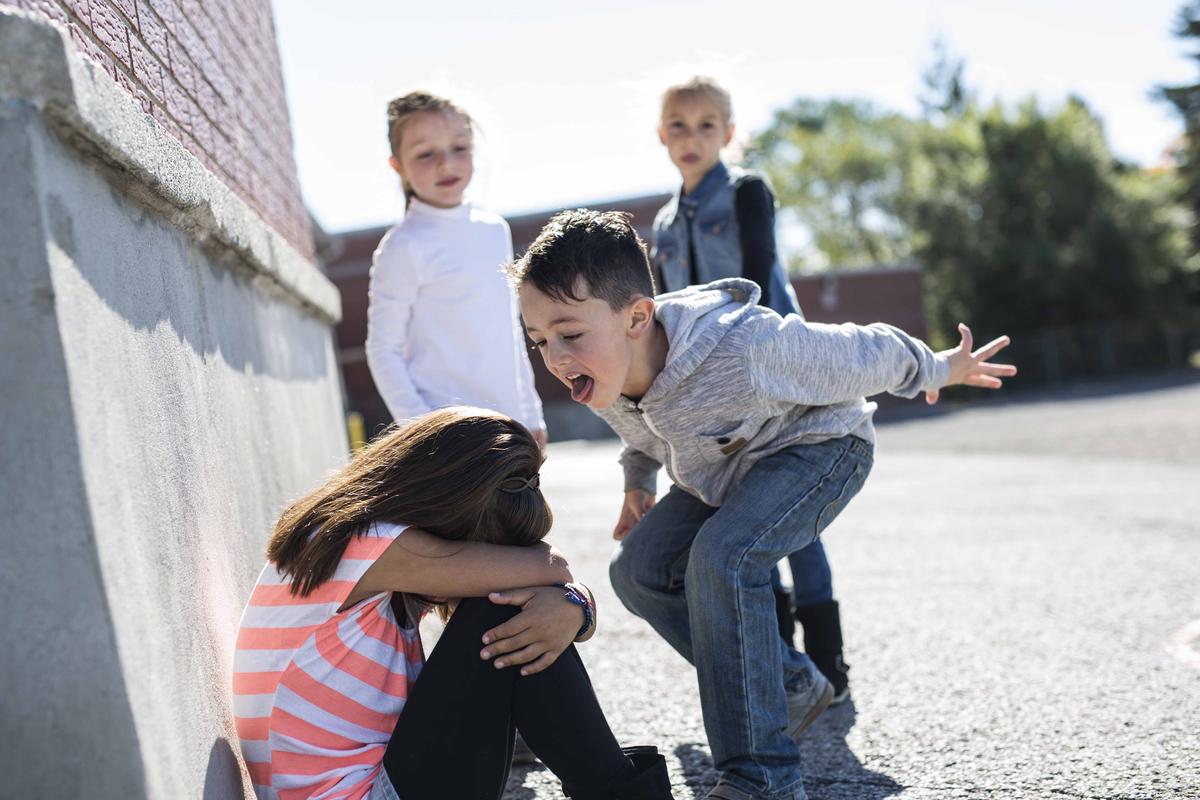 Illustration - Shutterstock | <a href="https://www.shutterstock.com/image-photo/sad-moment-elementary-age-bullying-schoolyard-498574384?src=lwOsfmqKS_ha4ONpPau_8Q-1-2">Lopolo</a>