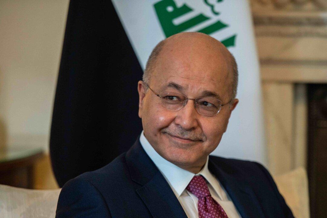 Iraqi President Threatens to Quit in Defiance of Iran’s Allies in Parliament
