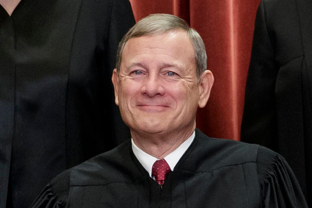 Chief Justice John Roberts Rejects Bid to Block Mask Mandate on Planes