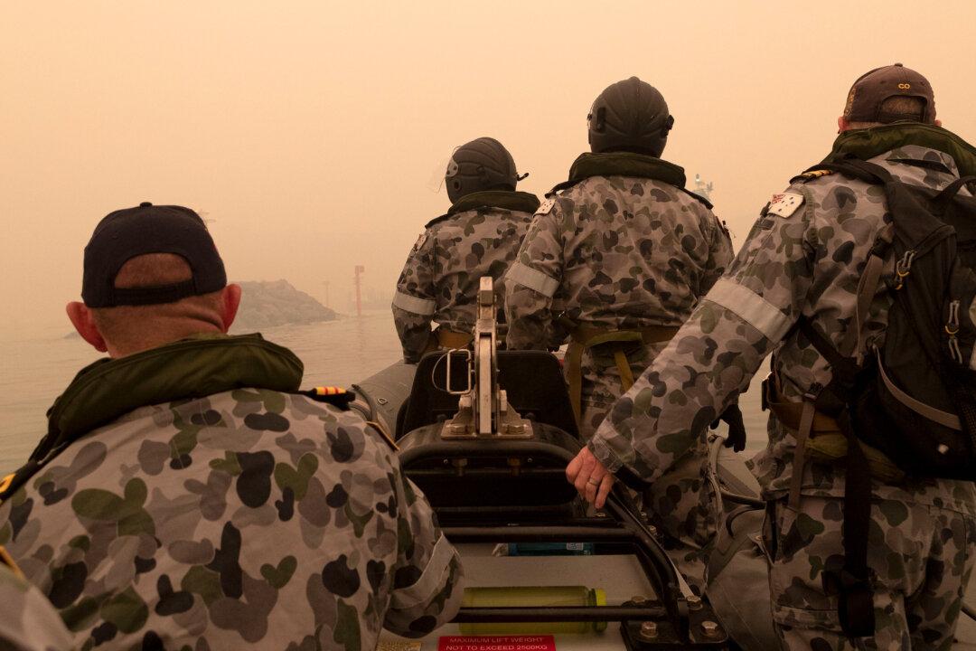 Australian Navy Begins Mass Evacuations as New Fire Threat Looms