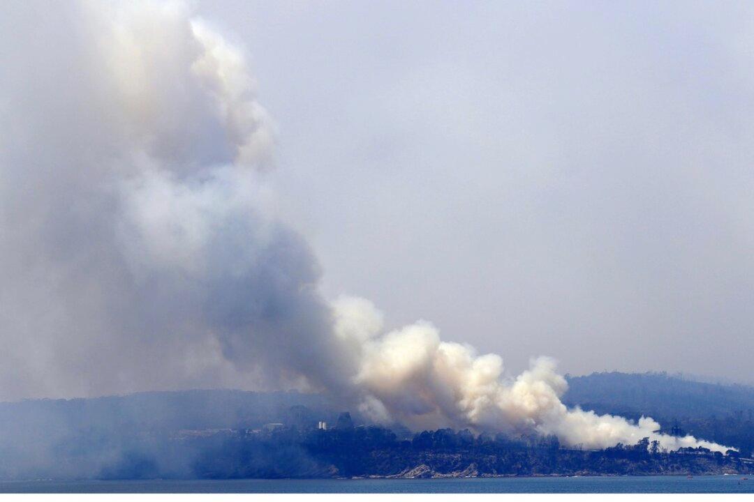 2 Aussie Wildfires Merge Into Inferno; Man Seriously Burned