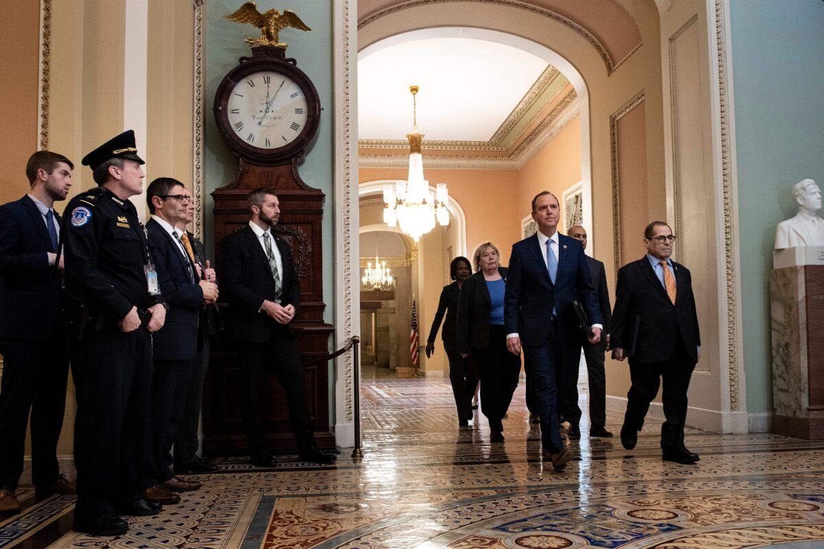 House managers, led by Chairman of the House Intelligence Committee Adam Schiff (2nd R) and Chairman of the House Judiciary Committee Jerry Nadler (R) walk to the Senate to deliver the Articles of Impeachment against President Donald Trump at the Capitol in Washington on Jan. 16, 2020. (Brendan Smialowski/AFP via Getty Images)
