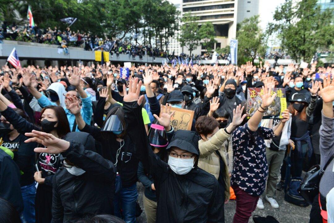 Hong Kong Police Fire Tear Gas to Disperse Thousands Calling for International Sanctions on Chinese Officials