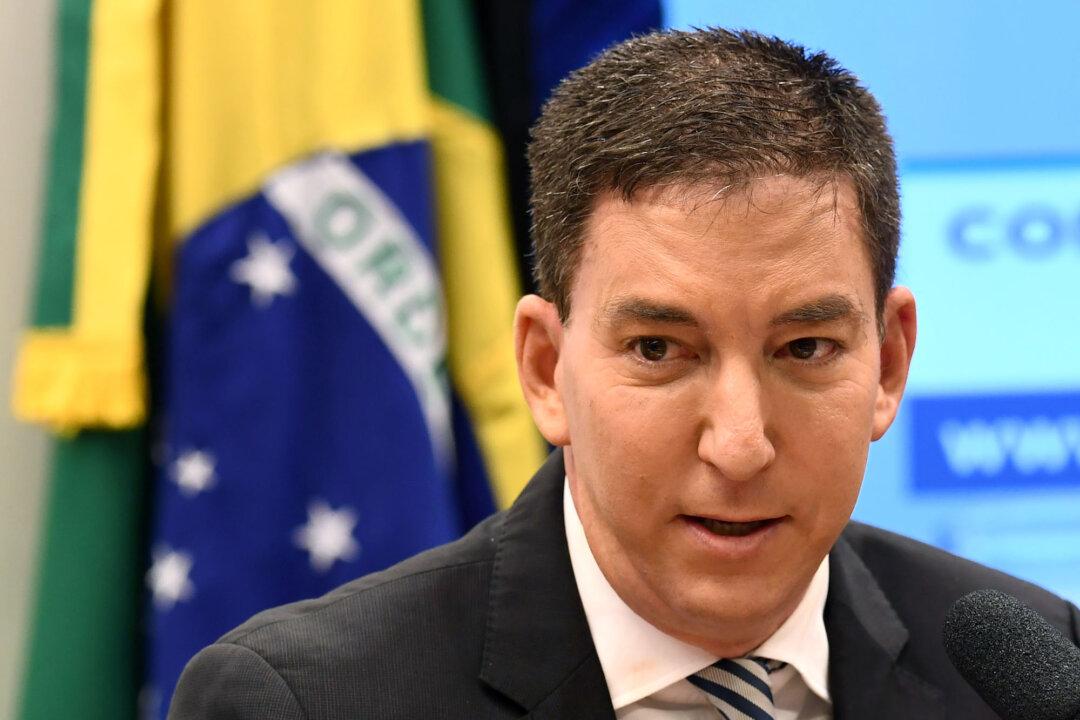 American Journalist Glenn Greenwald Charged With Hacking in Brazil