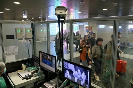 Officials monitor thermal scanners at a temperature monitoring station at Taipa Ferry Terminal in Macau, China, on Jan. 8, 2020. (Macau SAR Health Bureau/Reuters)