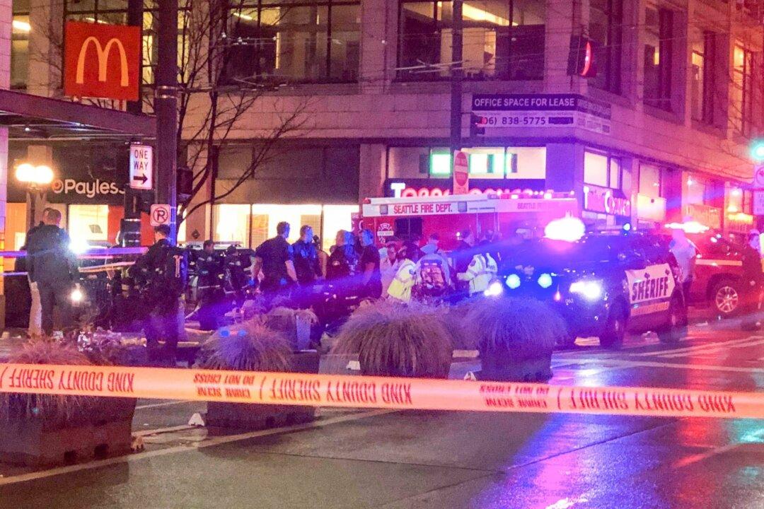 One Man Arrested, Two More Sought in Deadly Seattle Rush-Hour Shootout