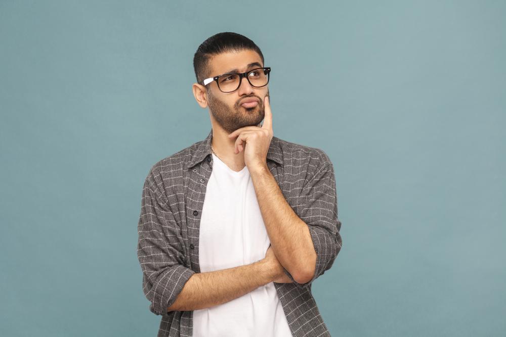 Illustration - Shutterstock | <a href="https://www.shutterstock.com/image-photo/portrait-bearded-thoughtful-handsome-man-black-1087677944">Khosro</a>