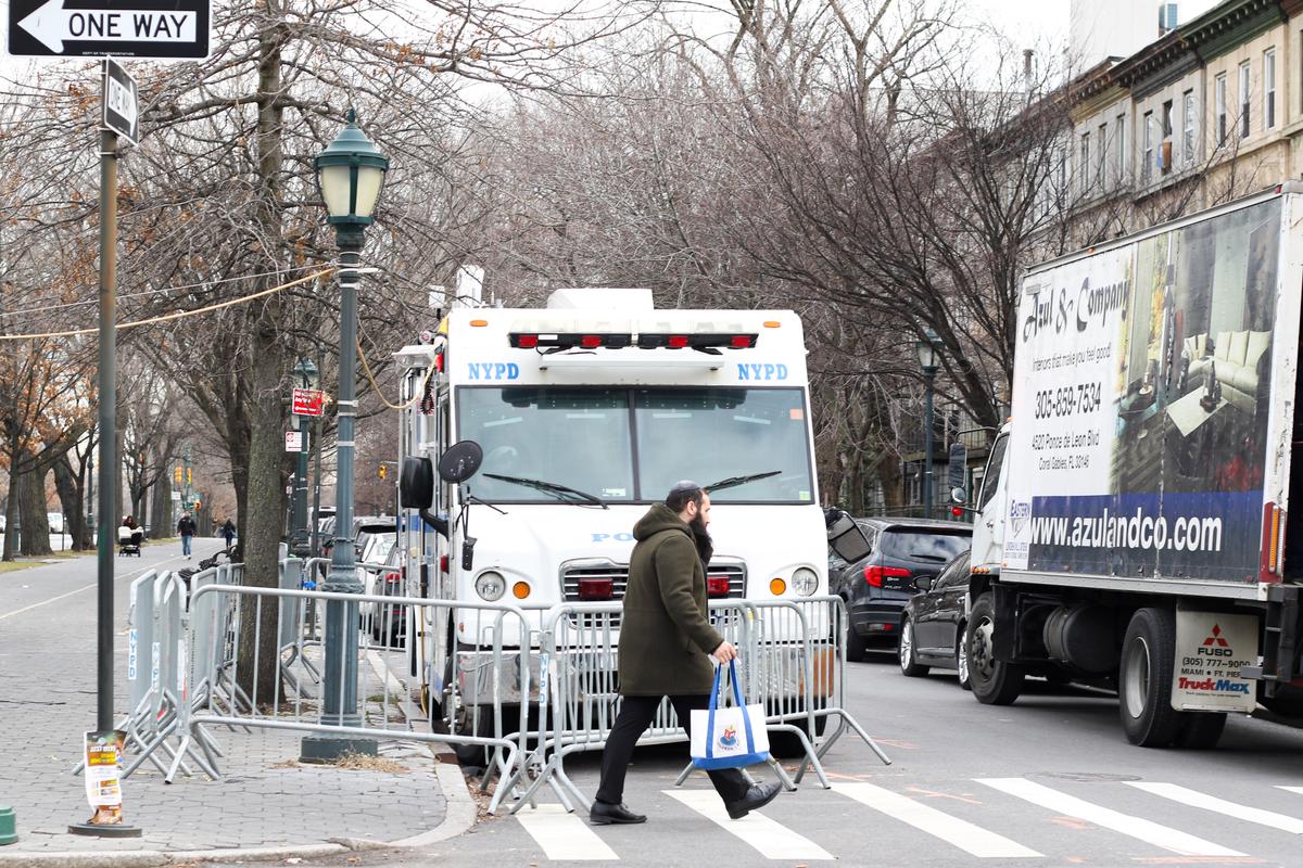 Jewish people walk in the Crown Heights neighborhood in Brooklyn, New York, on Jan. 7, 2020. (Chung I Ho/The Epoch Times)