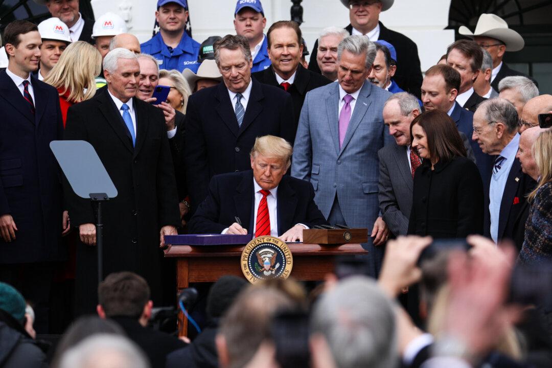 Trump Signs USMCA Trade Deal to End ‘NAFTA Nightmare’ in Major Policy Victory